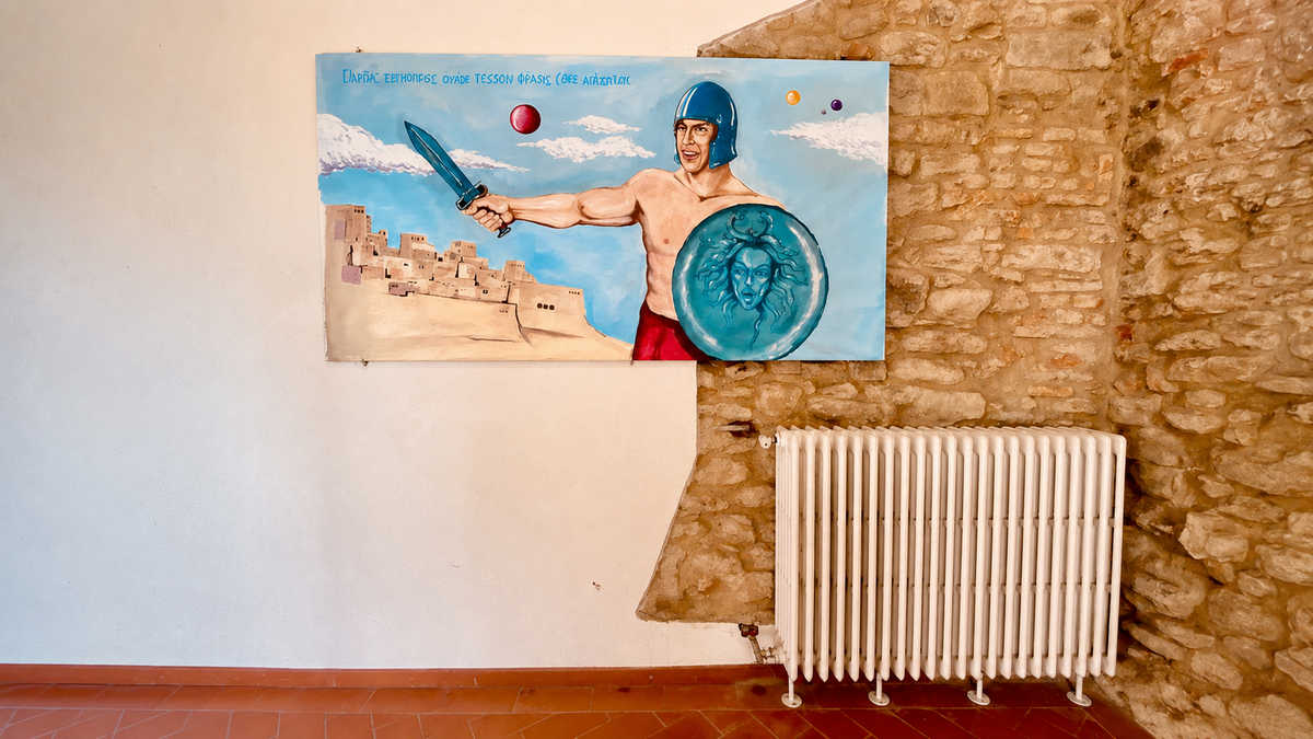 merelli-quadro-termosifone-comune-arezzo Traduzione della scritta in greco presente nel dipinto di Alberto Merelli
